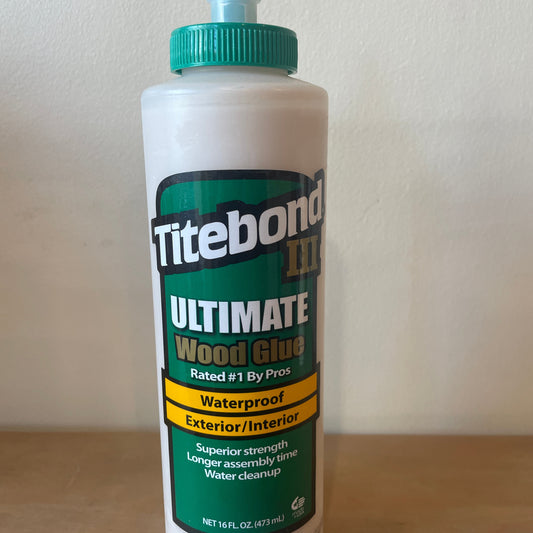 Titebond Ultimate Wood Glue bottle on a light background