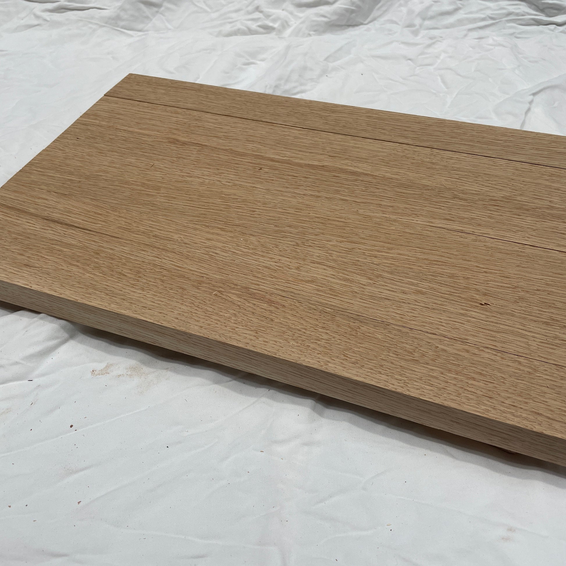 Wooden chopping board on a white background