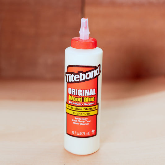 437ml Titebond Original Wood Glue bottle on a wooden surface